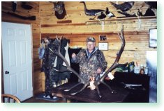 Don McKen measuring elk and fallow deer trophy antlers.